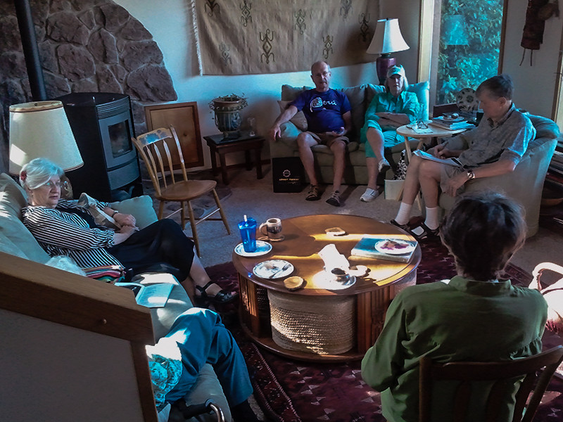 Photo shows six Ashland at Home members seated in a living room.